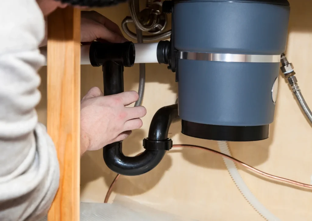 Garbage disposal repair San Diego specialist fixing kitchen disposal unit